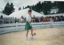 girl with papillon at a dog show