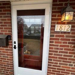 brick house with a white door 