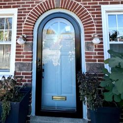 blue door with a black frame