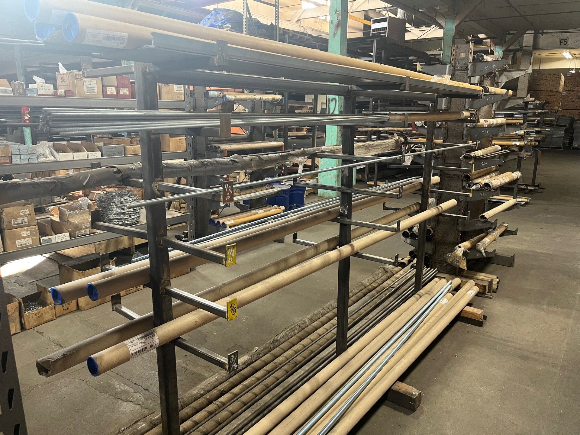A bunch of metal pieces are stacked on top of each other on a table.