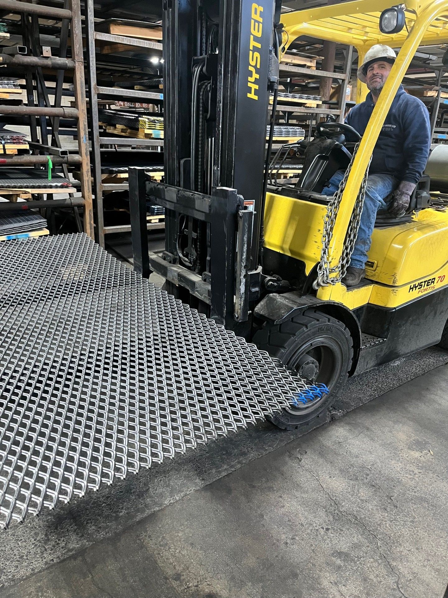 A bunch of metal pieces are stacked on top of each other on a table.