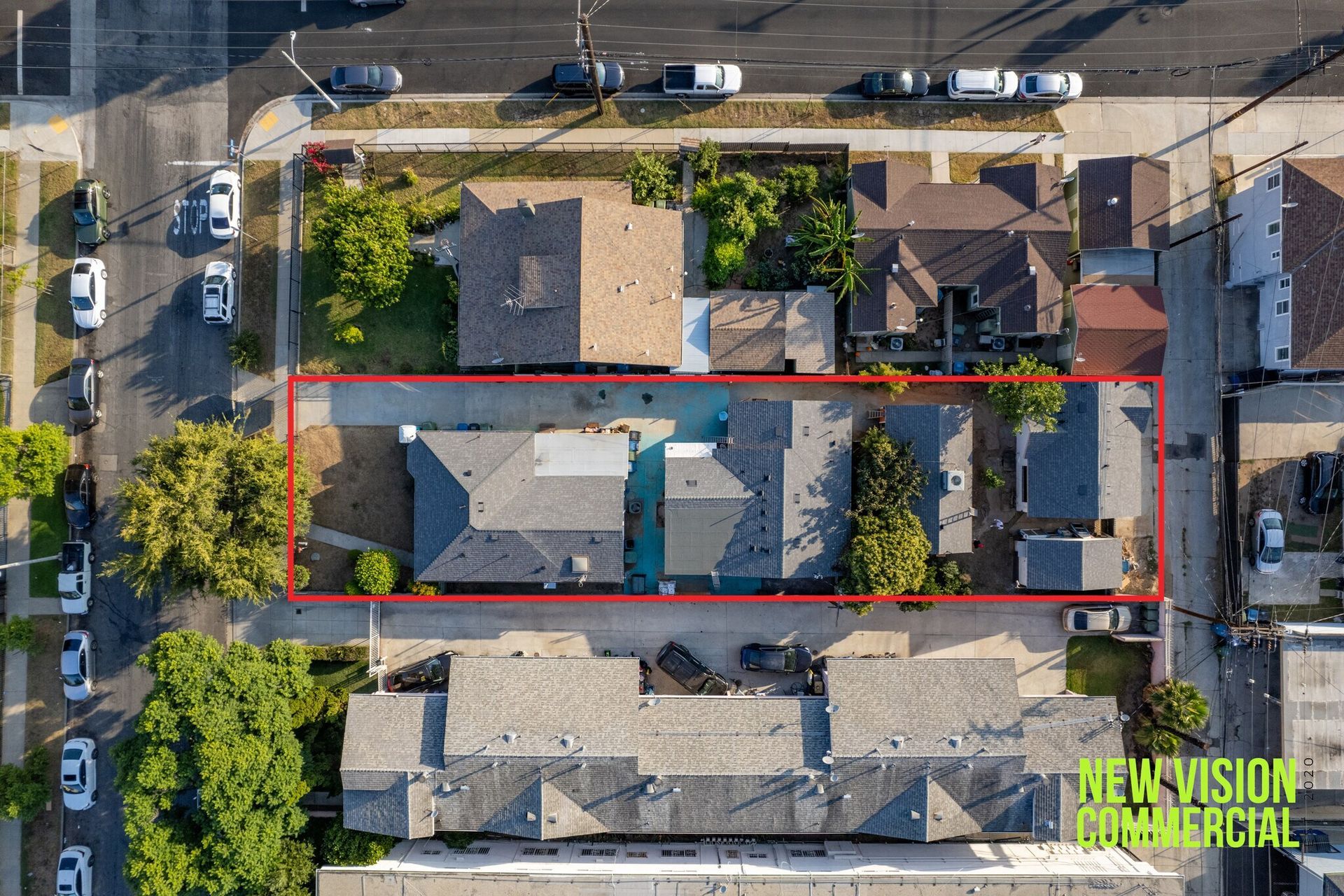 An aerial view of a house with a red line around it