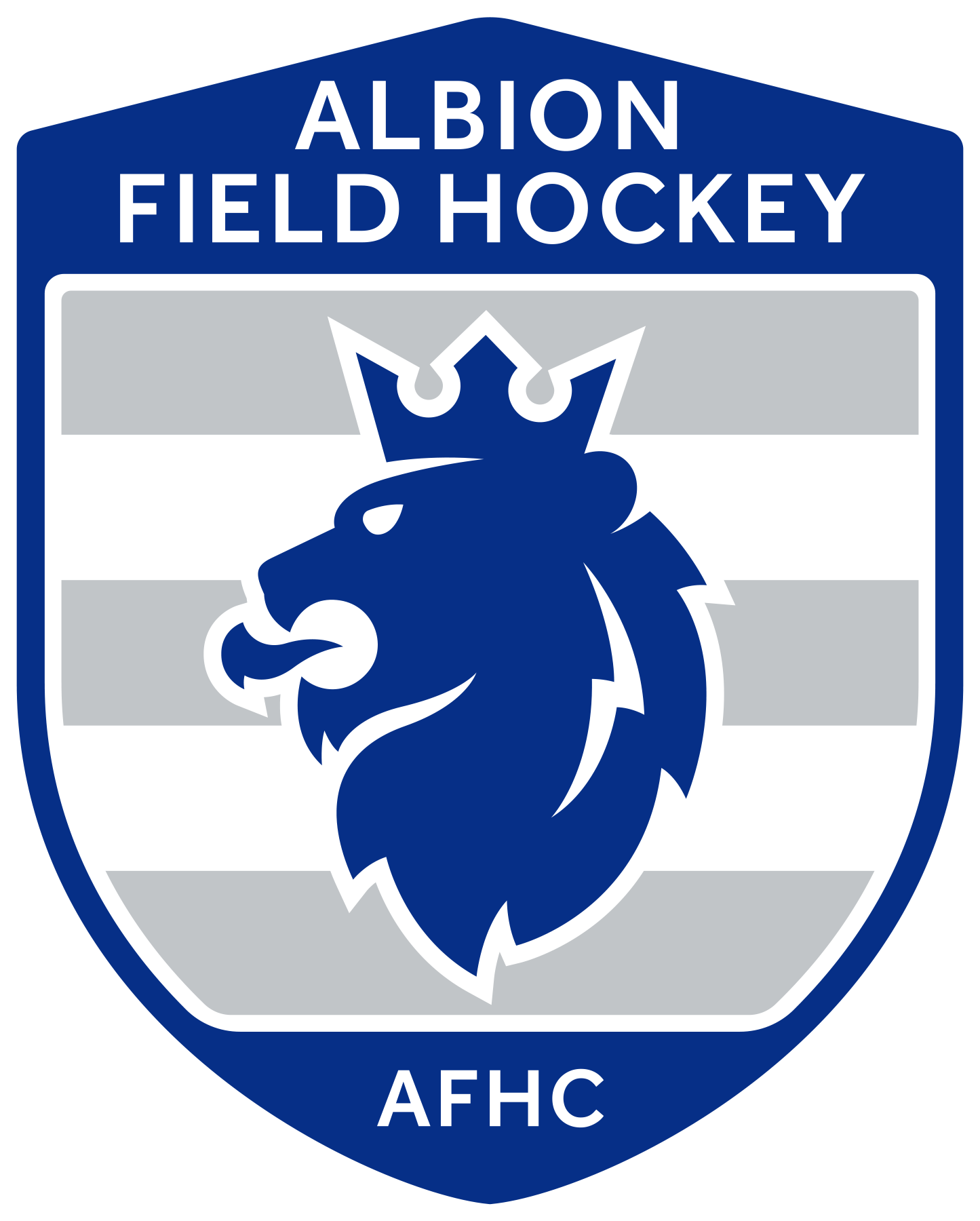 Albion Field Hockey logo: Blue lion head with crown, over gray stripes, within a blue shield. 
