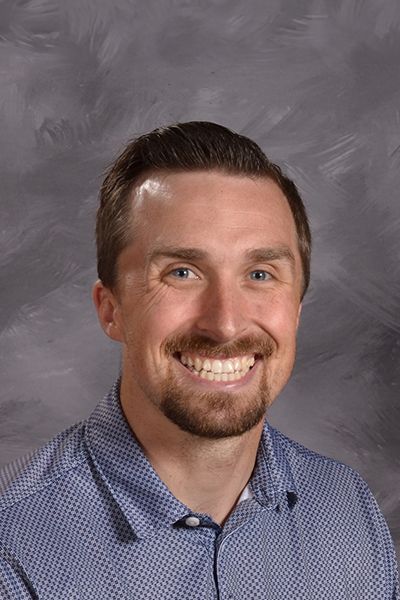 Head shot of Jason Malkowski smiling at the camera