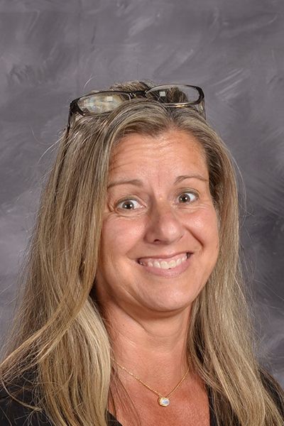 Head shot of smiling Stephanie Thomas smiling at the camera