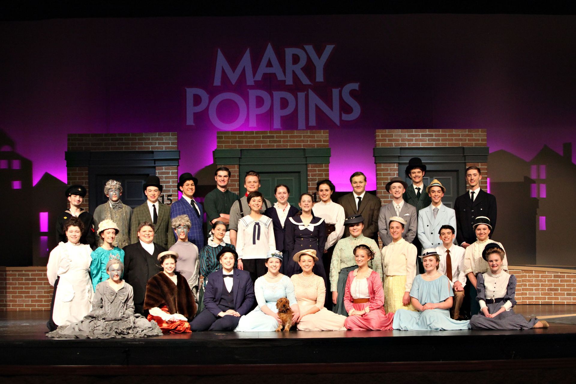 Entire cast on stage - group photo.