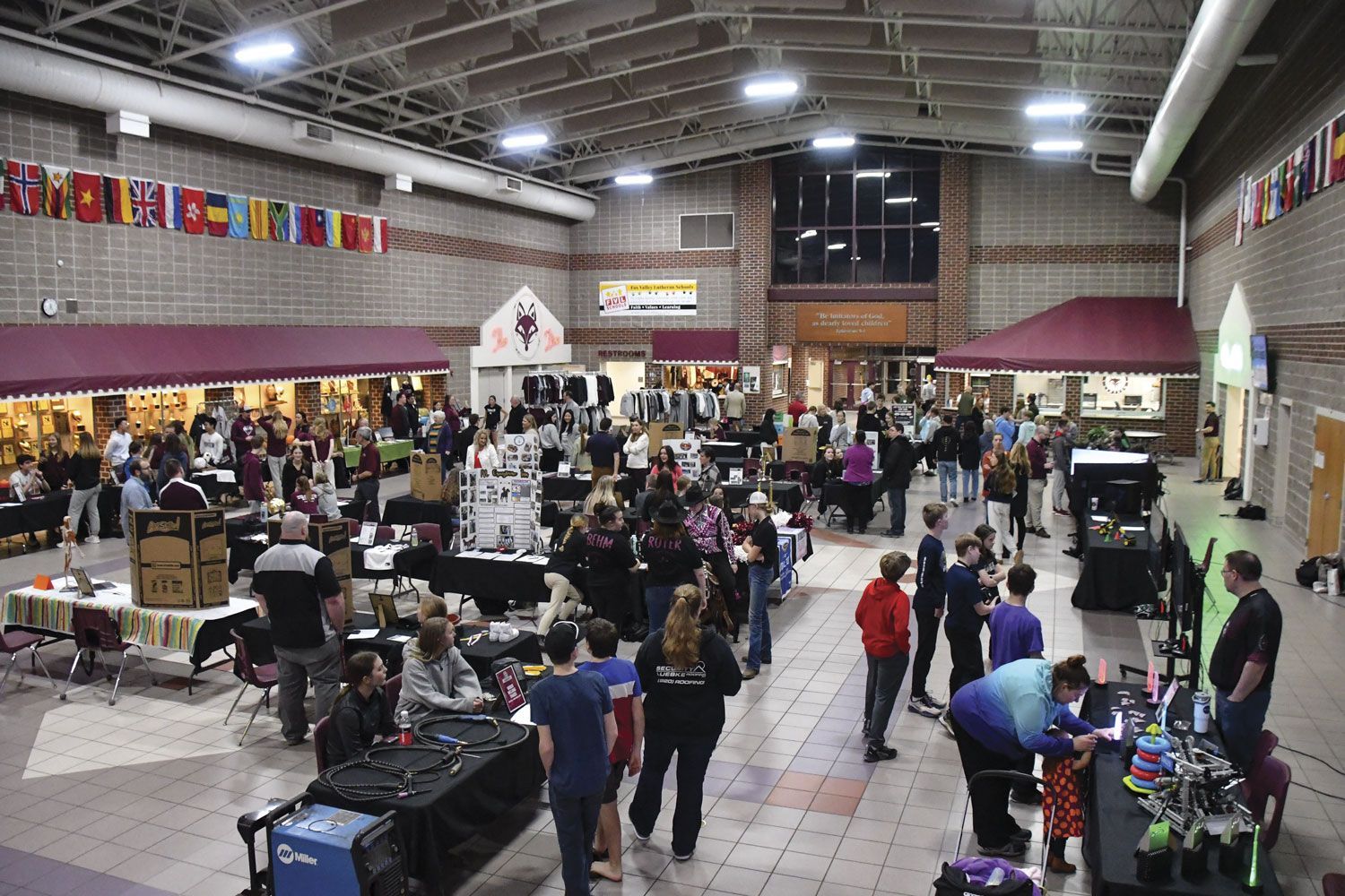 Visitors and booths in Commons for the Open House event