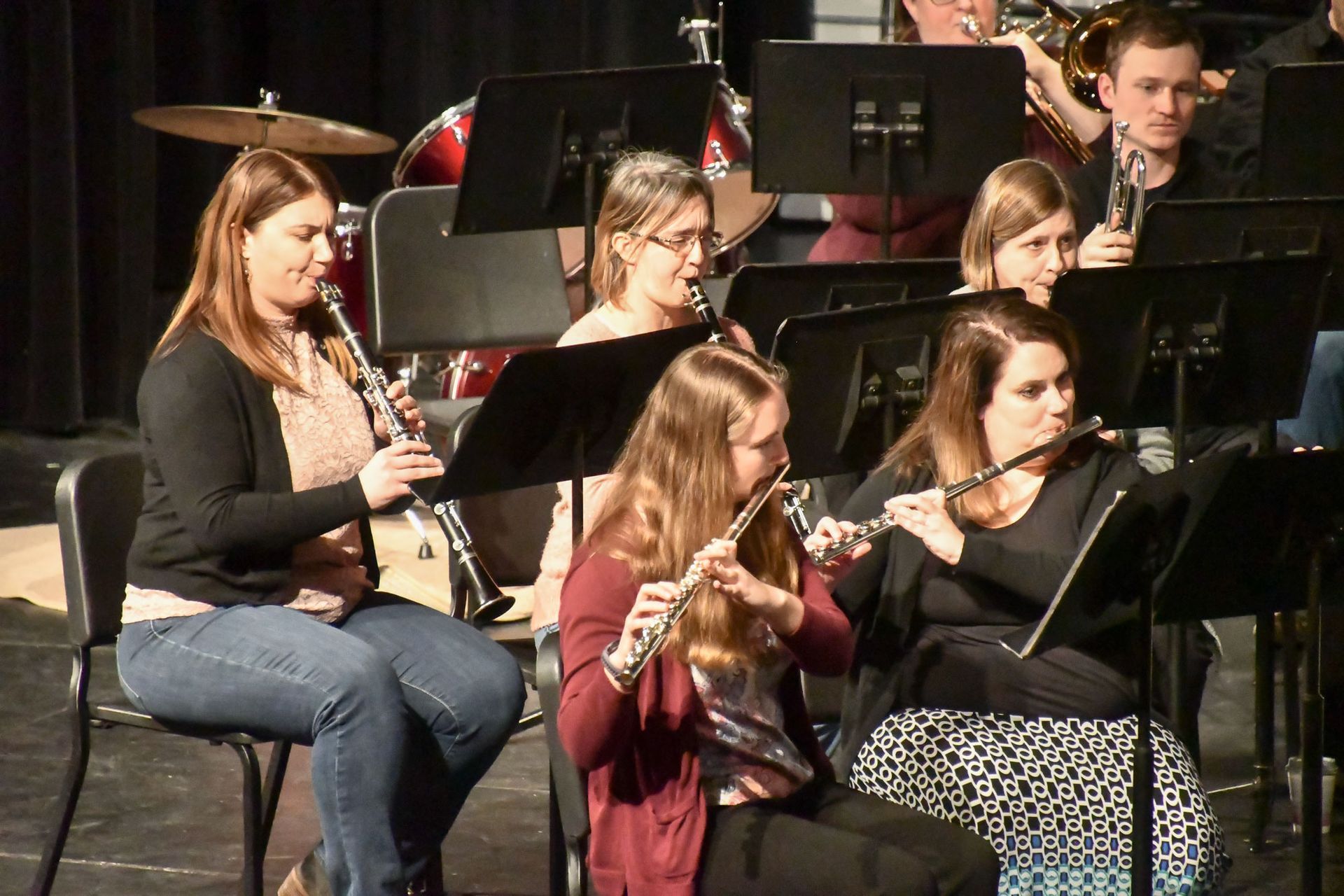 Alumni playing flutes and clarinets