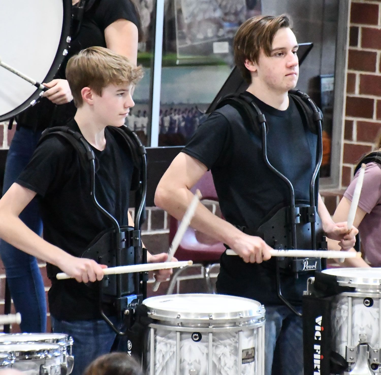 Drum line performing in Commons during Musicfest