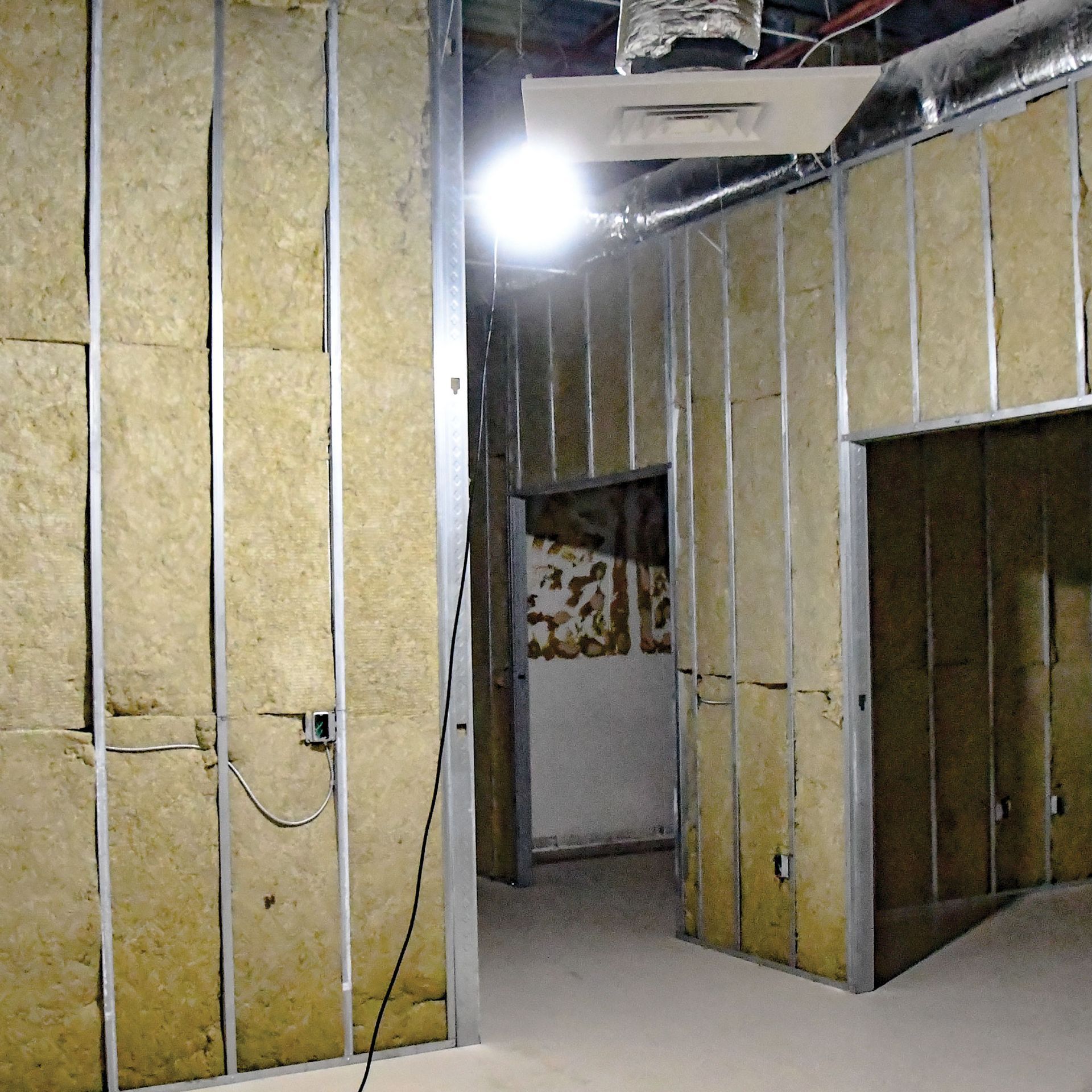 Communications Suite showing the framing and insulation for the new office areas