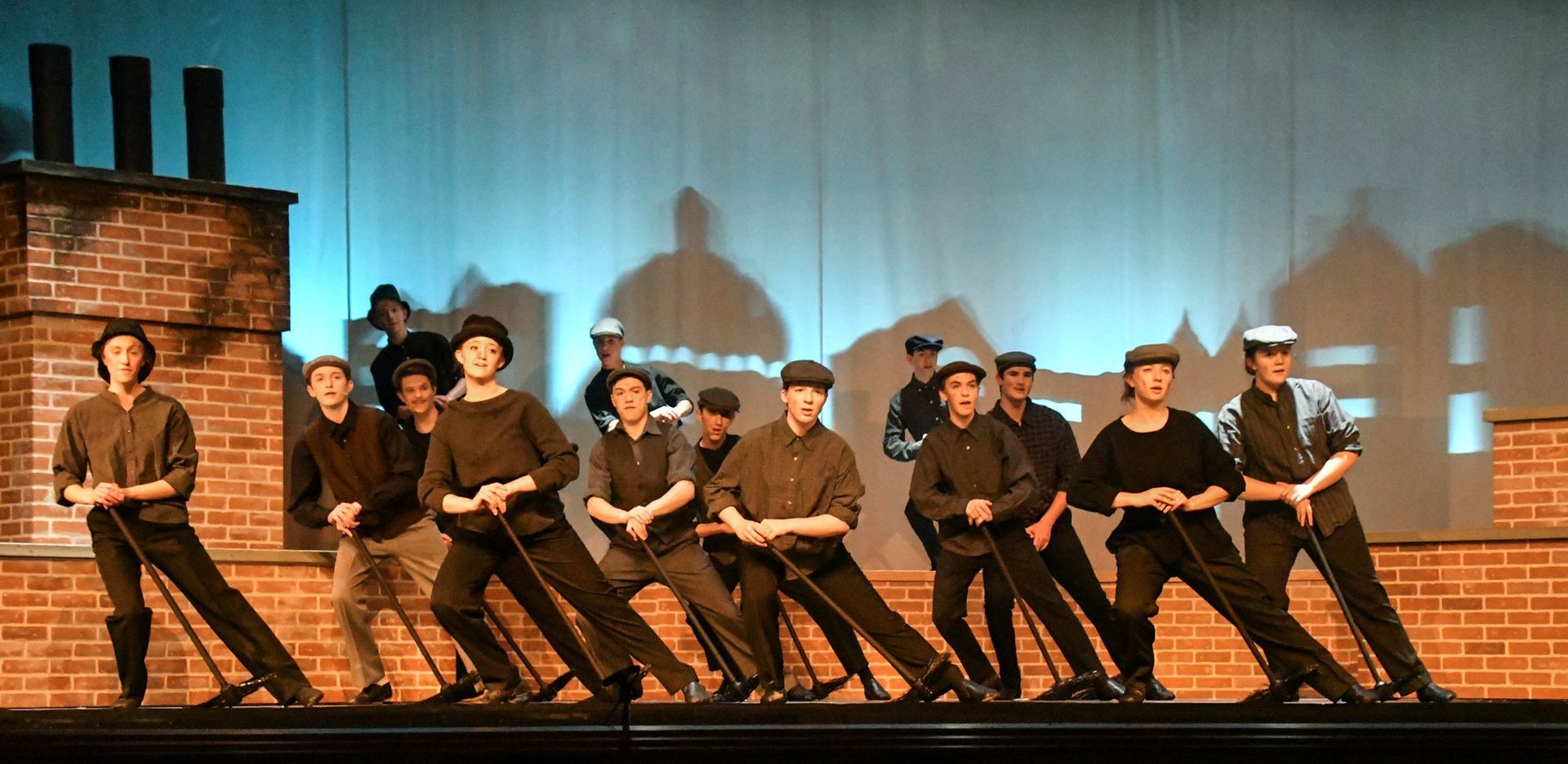 Many chimney sweeps dancing.