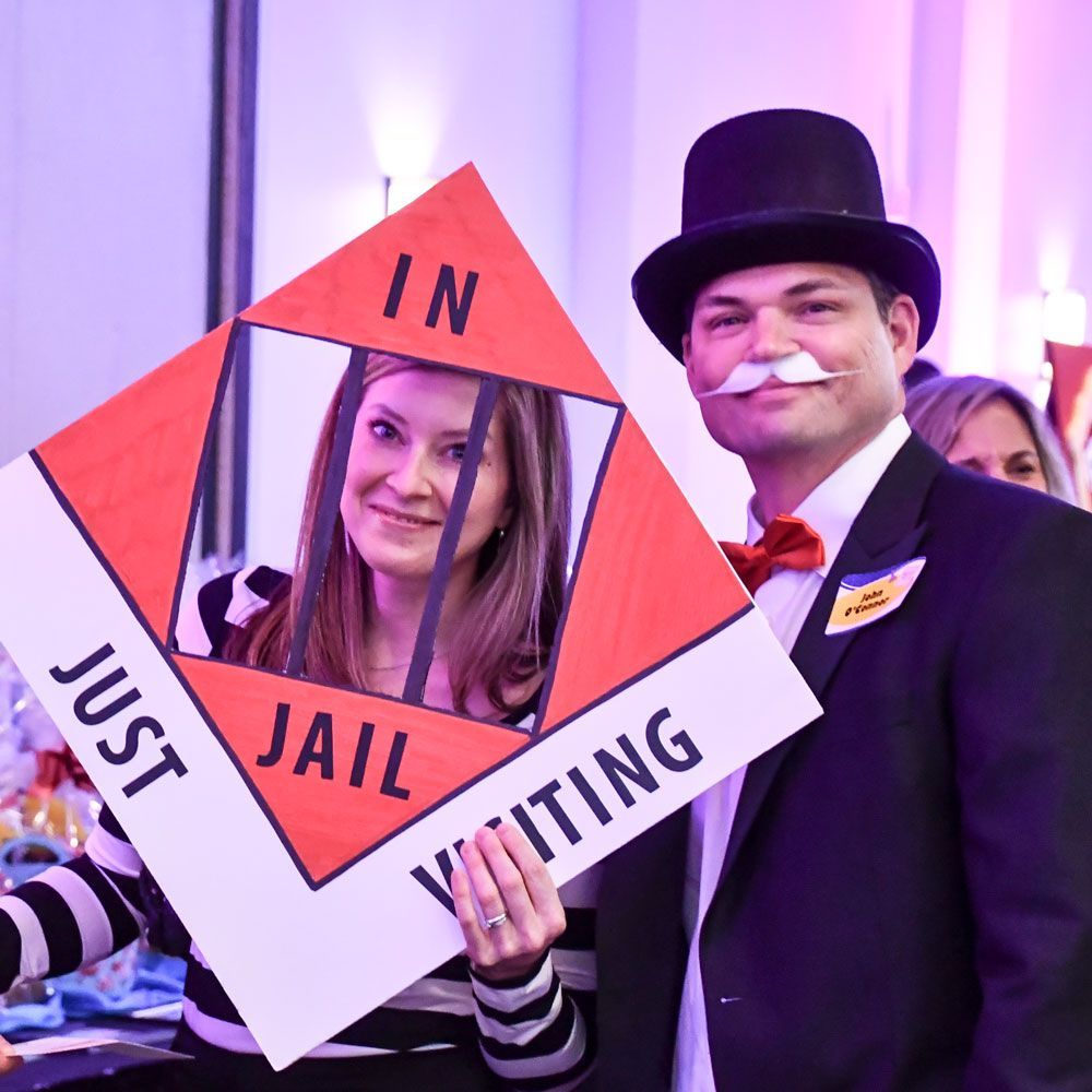 Smiling couple in costume at last year's