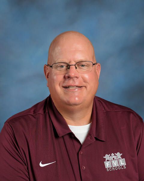 Smiling headshot of Phil Punzel