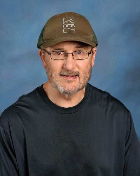 Smiling headshot of Mike Reick
