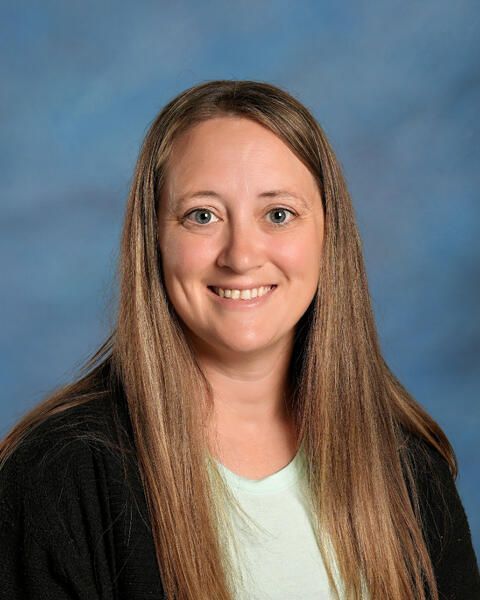 Smiling headshot of Mary Robinson