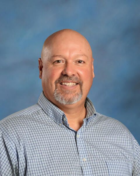 Smiling headshot of Darin Stewart