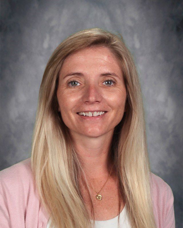 Head shot of smiling Amy Gilmet smiling at camera