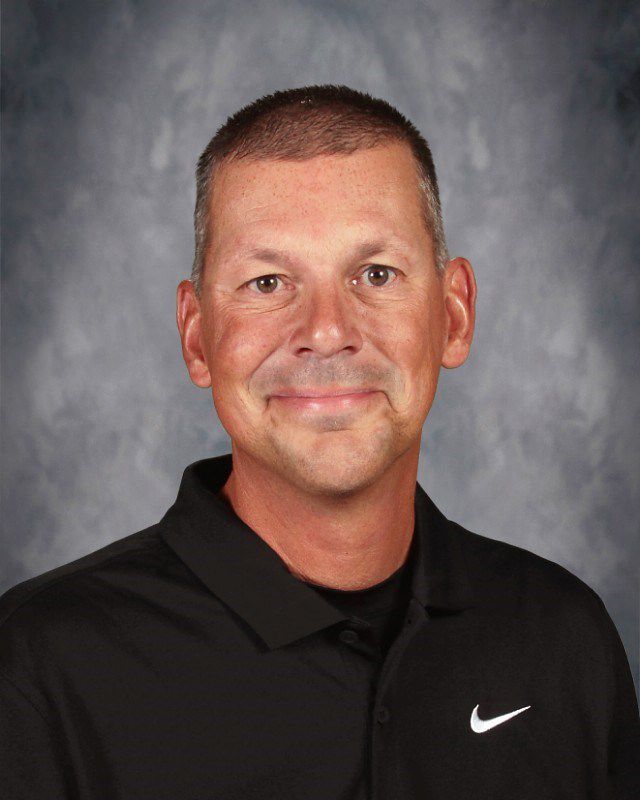 Head shot of Tom Guenterberg smiling at the camera