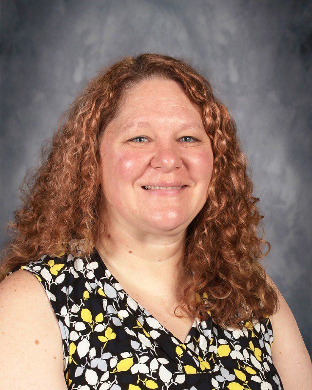 Head shot of Jenny Koch smiling at the camera