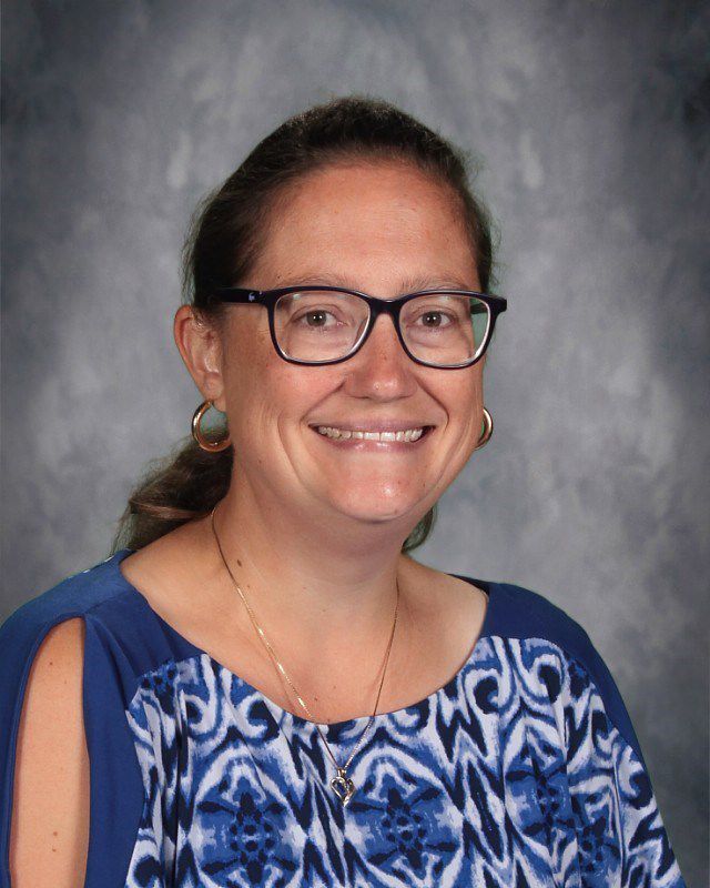 Head shot of Katie Luebke smiling at the camera