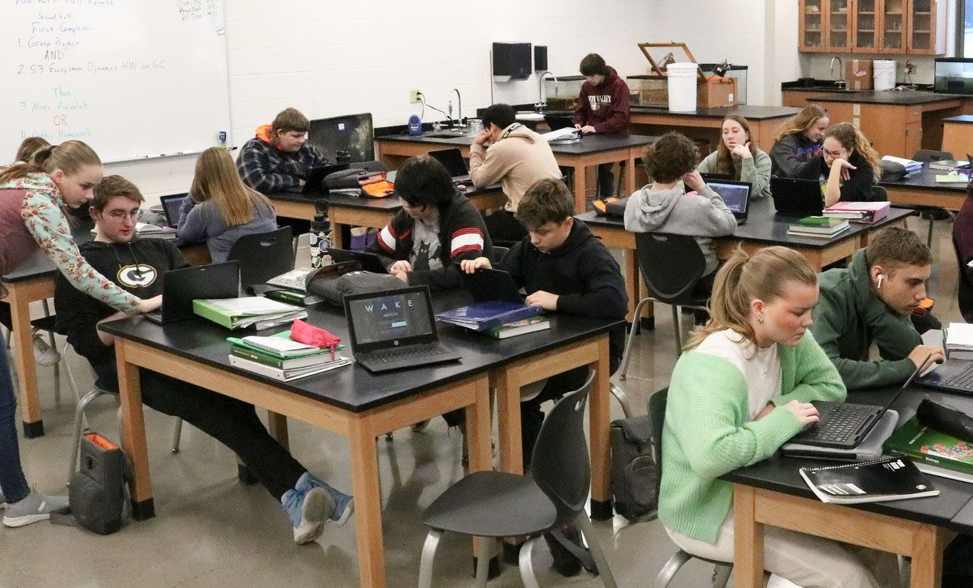Science classroom with students playing 
