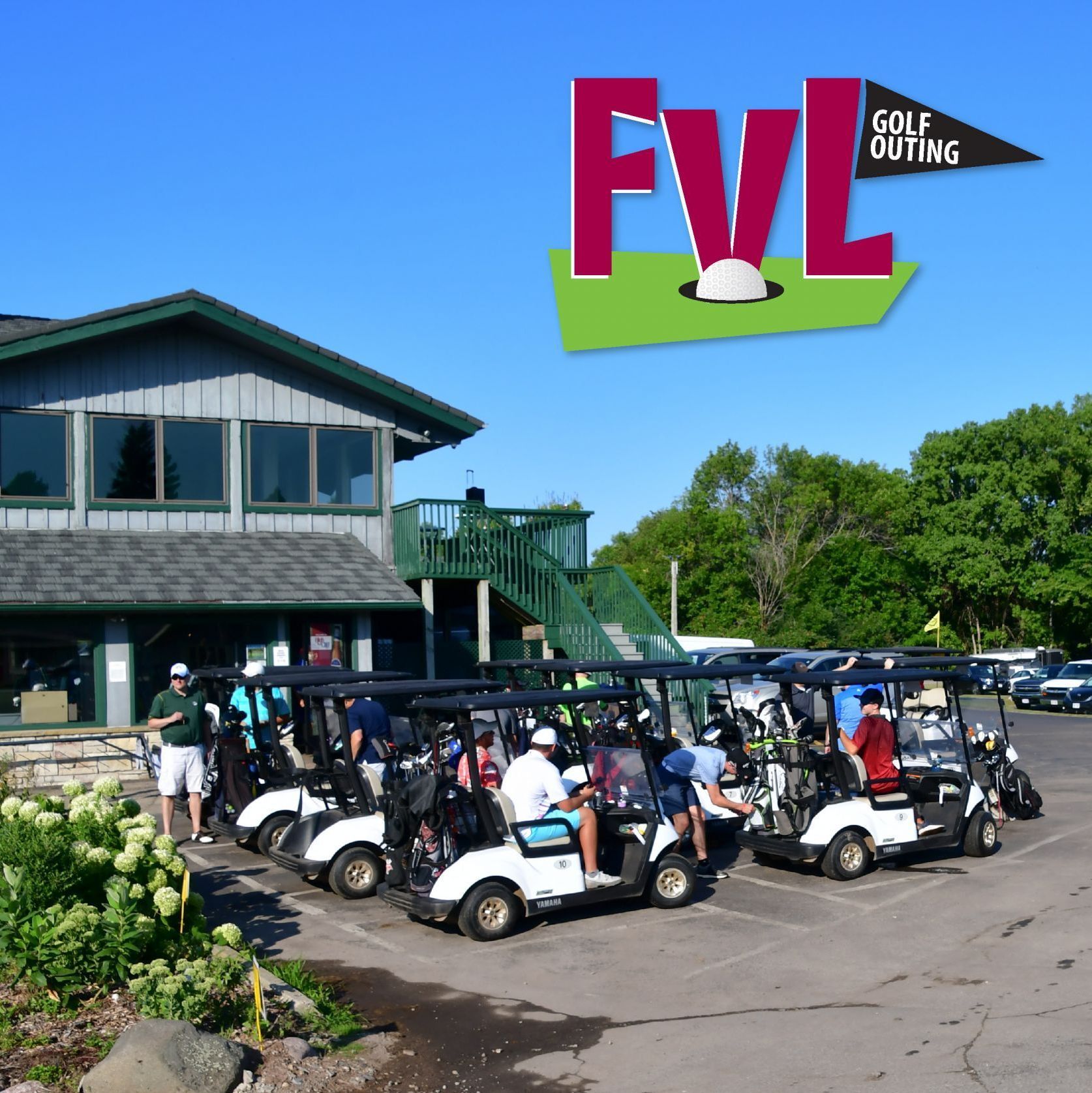 High Cliff Golf Course clubhouse with golf cards in front and the FVL Golf Outing logo in the top right corner