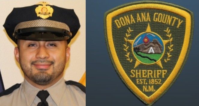 Sheriff wearing uniform smiling next to Doña Ana County Sheriff badge.