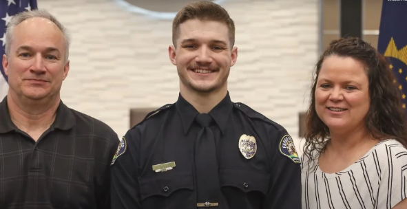 Officer Jake Wallin and his parents. 