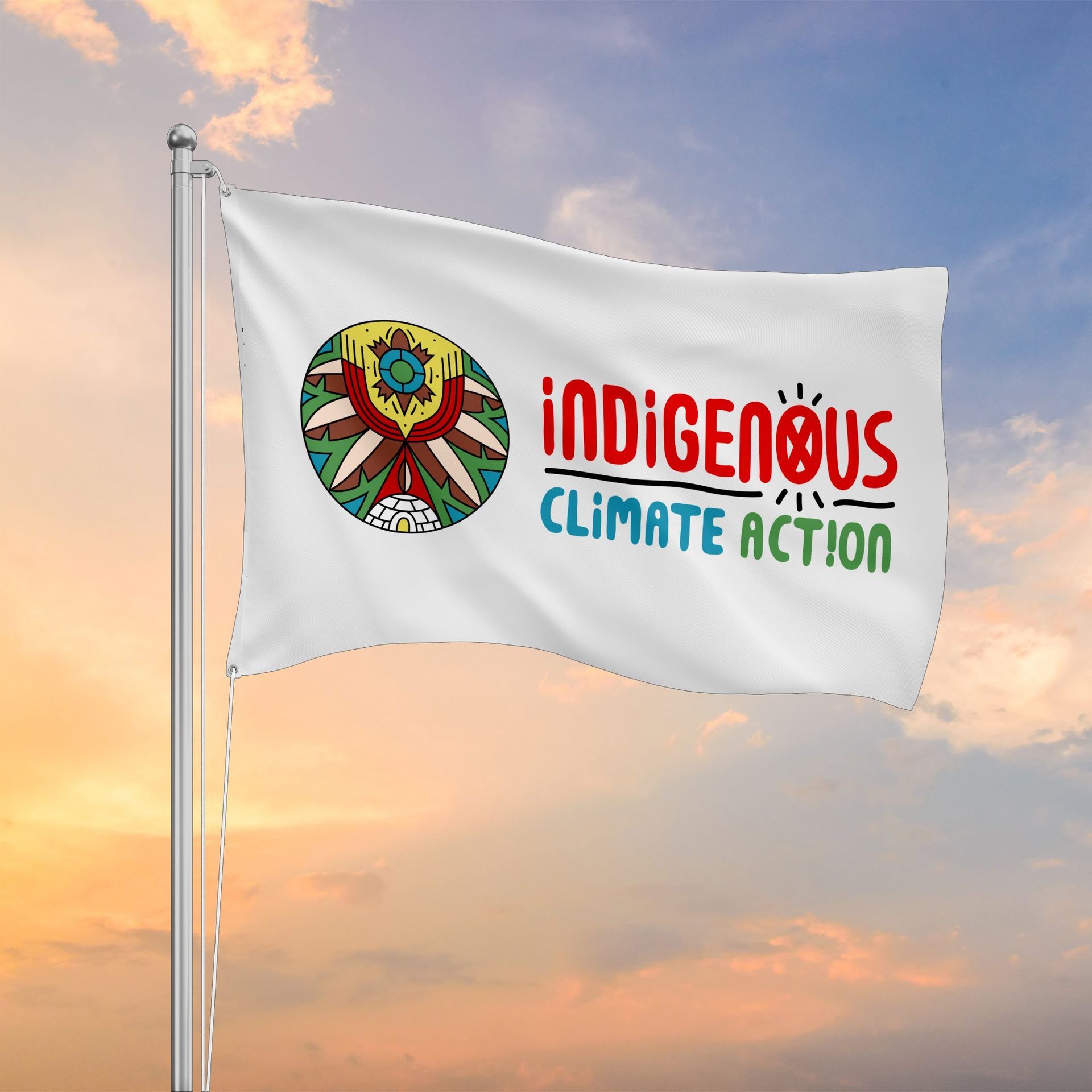 An indigenous climate action flag is flying in the wind