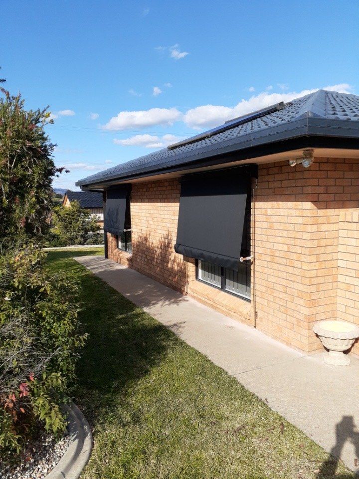 House with Awnings on Windows — Tamworth Blinds & Awnings in Tamworth, NSW
