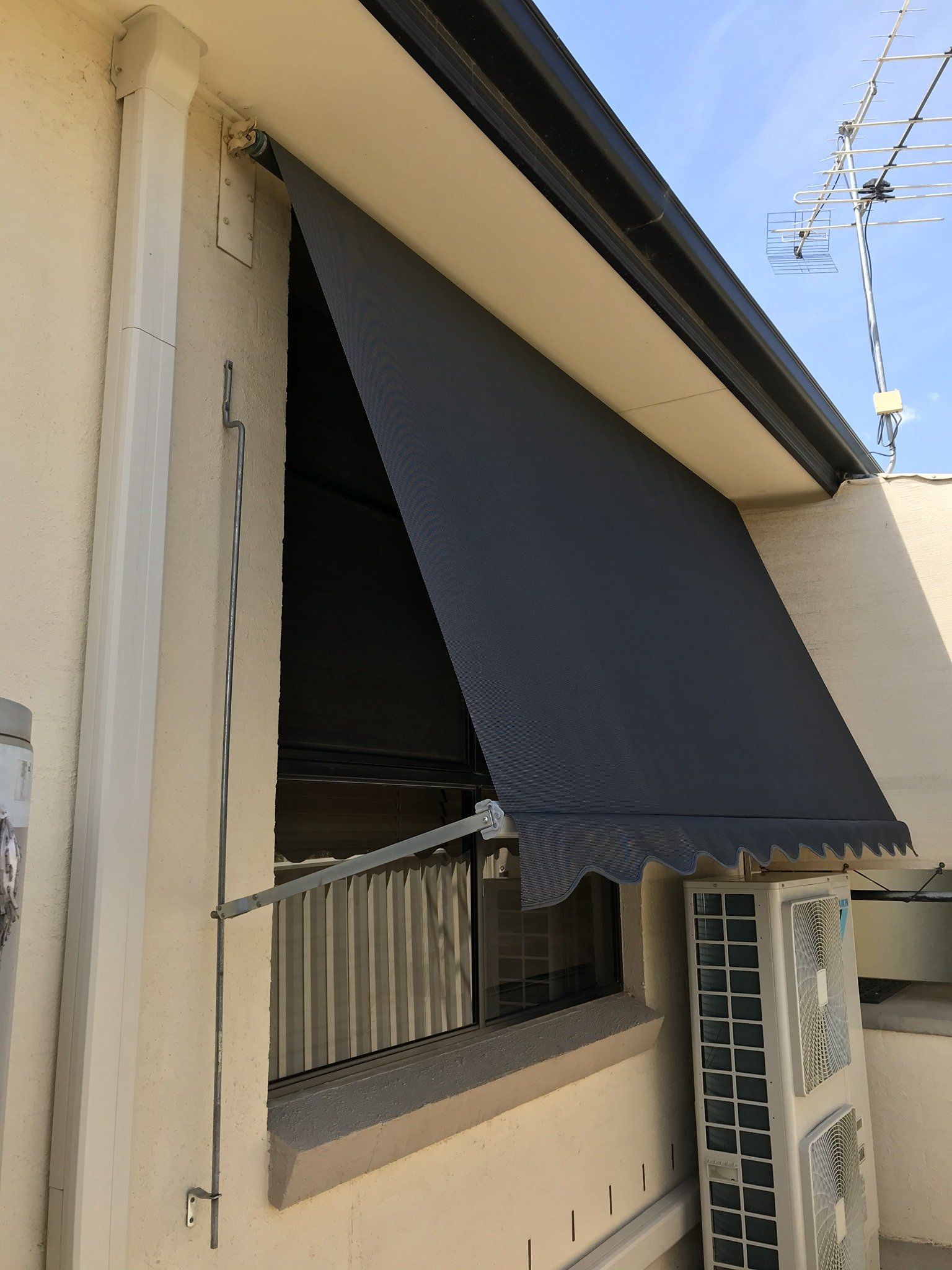 Window and Awning Besides an Air Conditioning System — Tamworth Blinds & Awnings in Tamworth, NSW