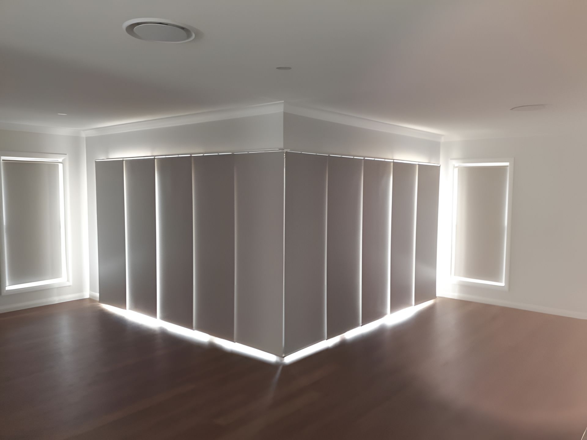 An Empty Room with a White Blinds on the Windows — Tamworth Blinds & Awnings in Tamworth, NSW