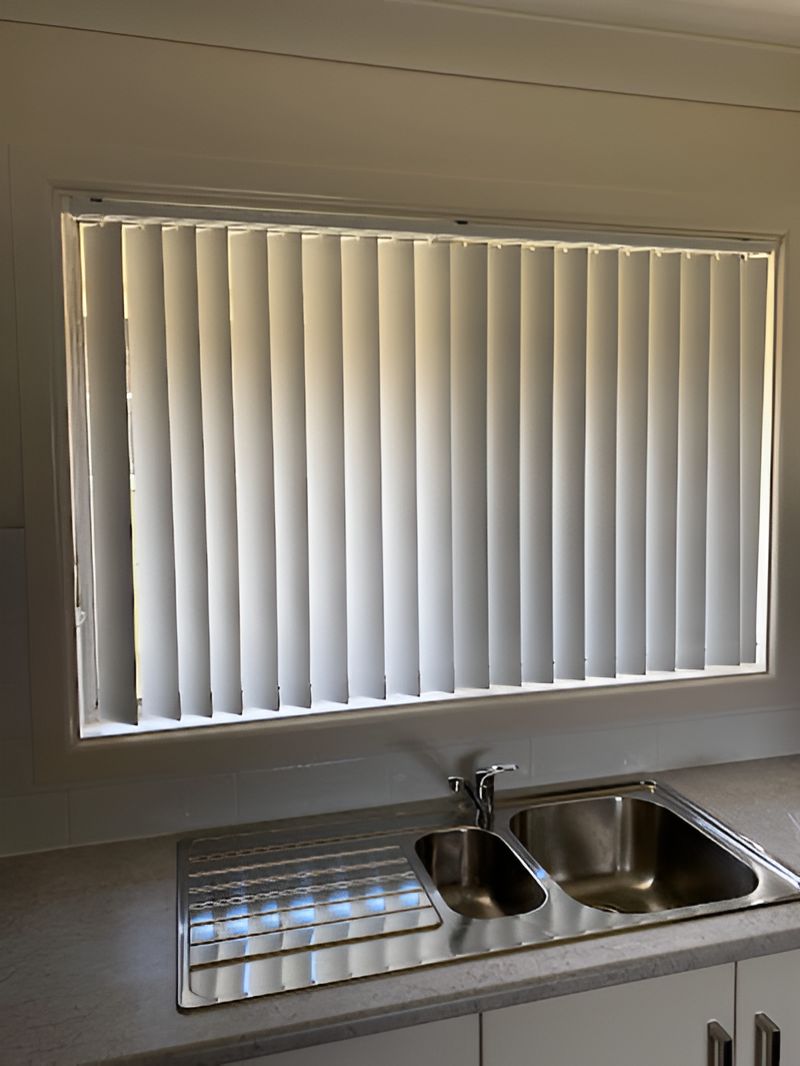 A Kitchen With a Sink and a Window With Blinds — Tamworth Blinds & Awnings in Tamworth, NSW