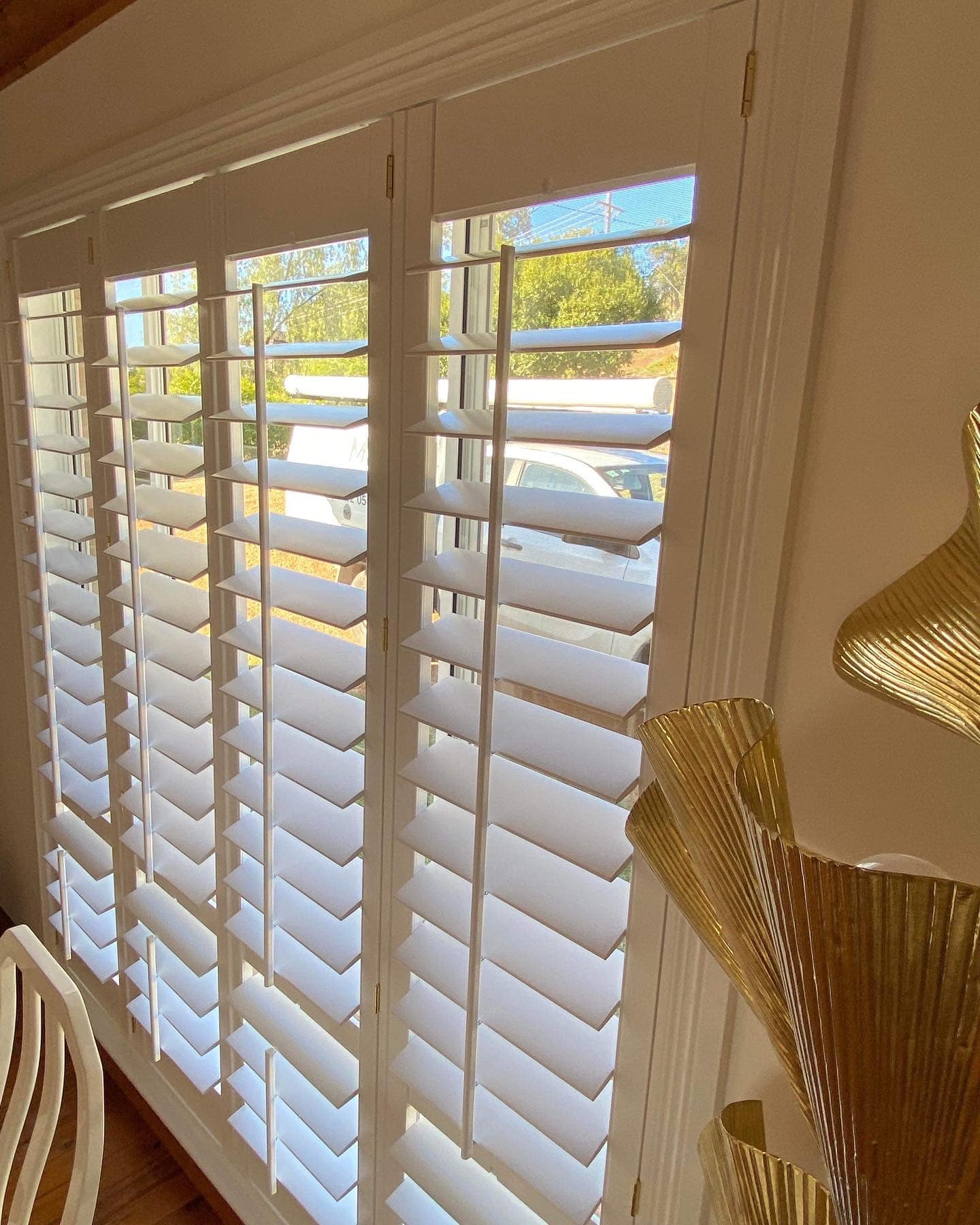 Freshly Installed Custom Shutters in an Empty Bedroom — Tamworth Blinds & Awnings in Tamworth, NSW