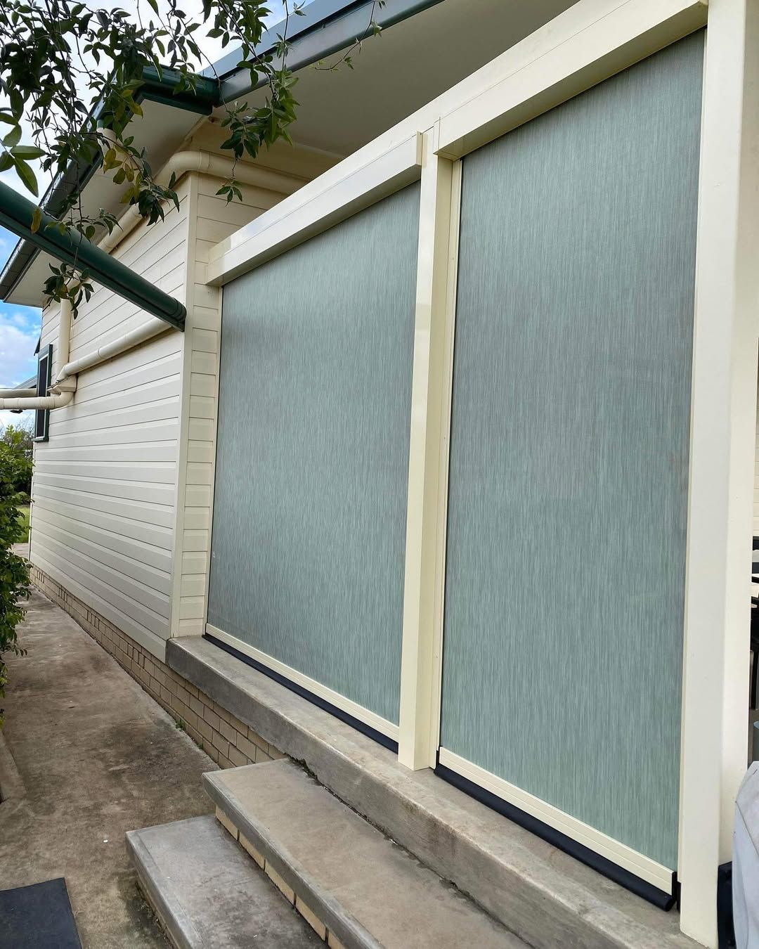 A House With Blinds on the Windows and Stairs Leading Up to It — Tamworth Blinds & Awnings in Narrabri, NSW