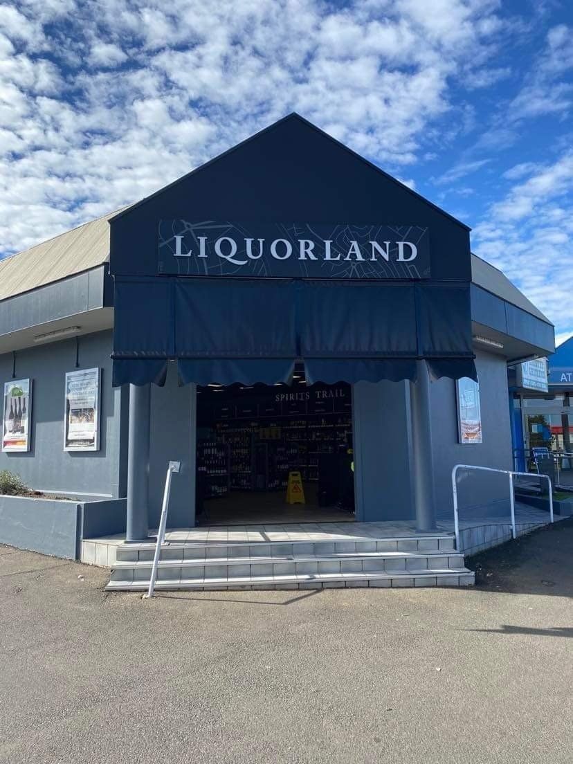 Liquorland with Black Awnings — Tamworth Blinds & Awnings in Tamworth, NSW
