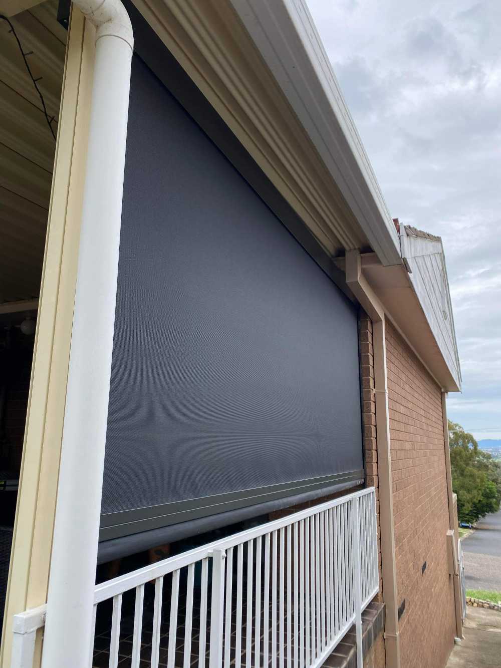 Newly Installed Awnings on the Side of a Brick House — Tamworth Blinds & Awnings in Tamworth, NSW