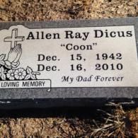 A grave marker for Allen Ray Dicus, 