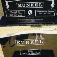 Two black upright granite grave markers for the Kunkel family, showing names, dates, and a photo of a person.