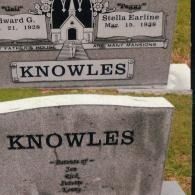 Two gray stone grave markers with the name 