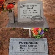Two grave markers set in grass: a granite upright for Ernie Wayne Neal (1943–2016) and a flat marker for Gary Curtis Putensen.