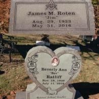 Two gravestones in an outdoor setting: one rectangular for James M. Roten and a heart-shaped one for Beverly Ann Ratliff.