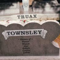 A gray stone monument inscribed with 