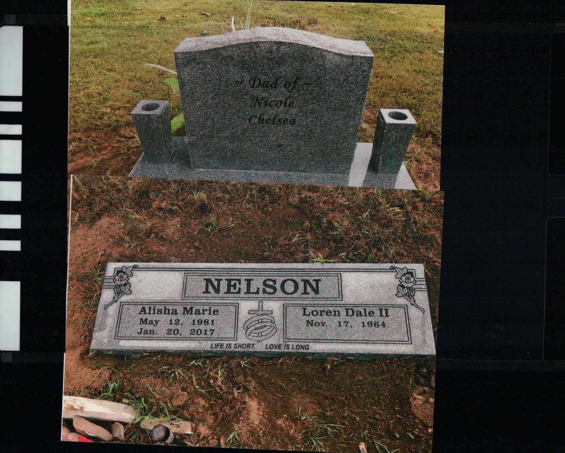 A cemetery monument showing an upright headstone behind a flat grave marker engraved with the name Nelson.