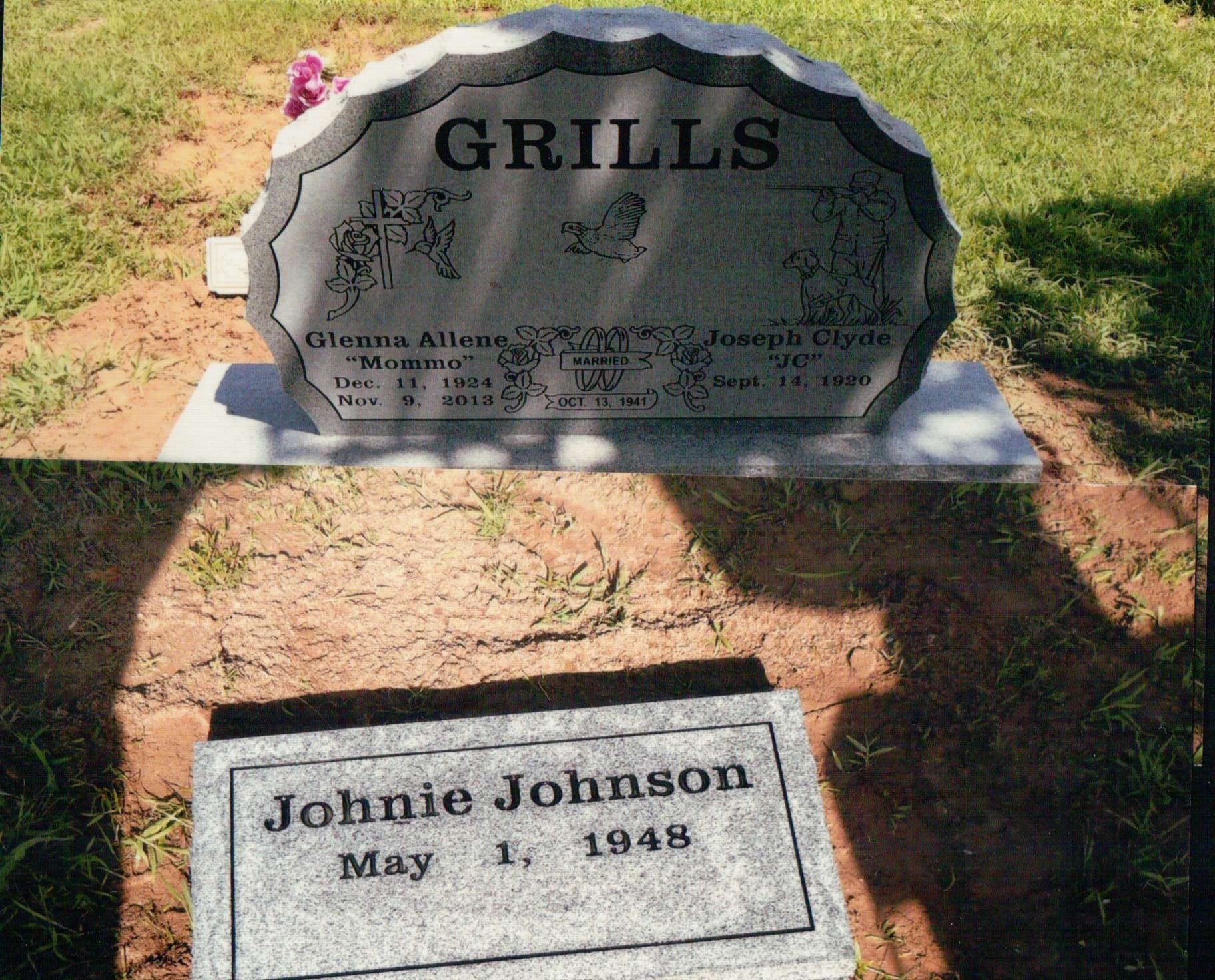 A headstone for the Grills family and a flat marker for Johnie Johnson set in a grassy graveyard.