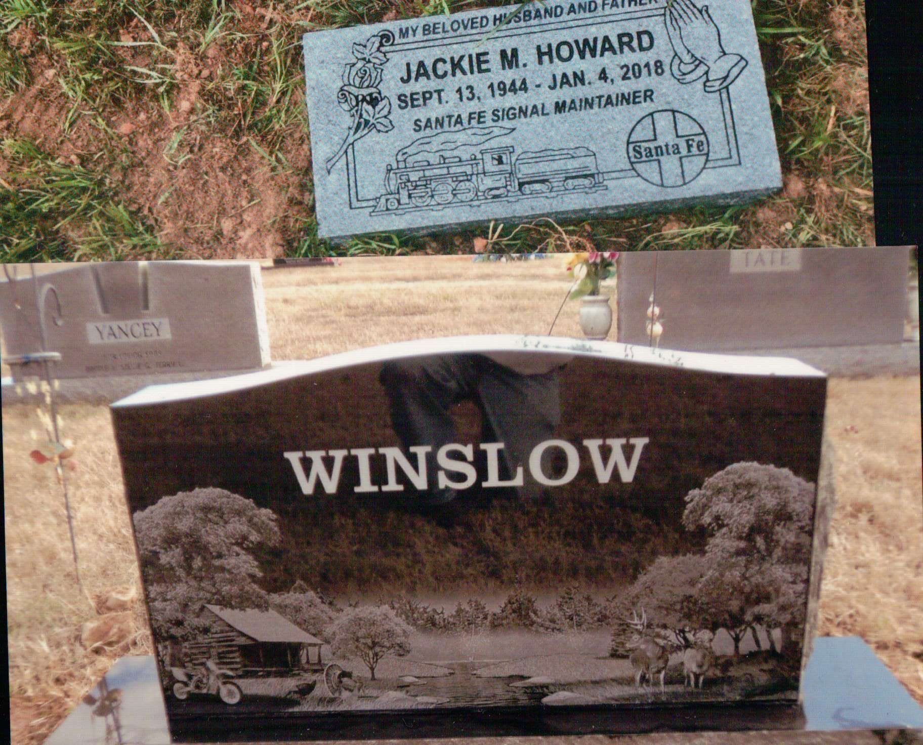 A light-colored stone marker for Jackie M. Howard above a dark, horizontal granite headstone engraved with 