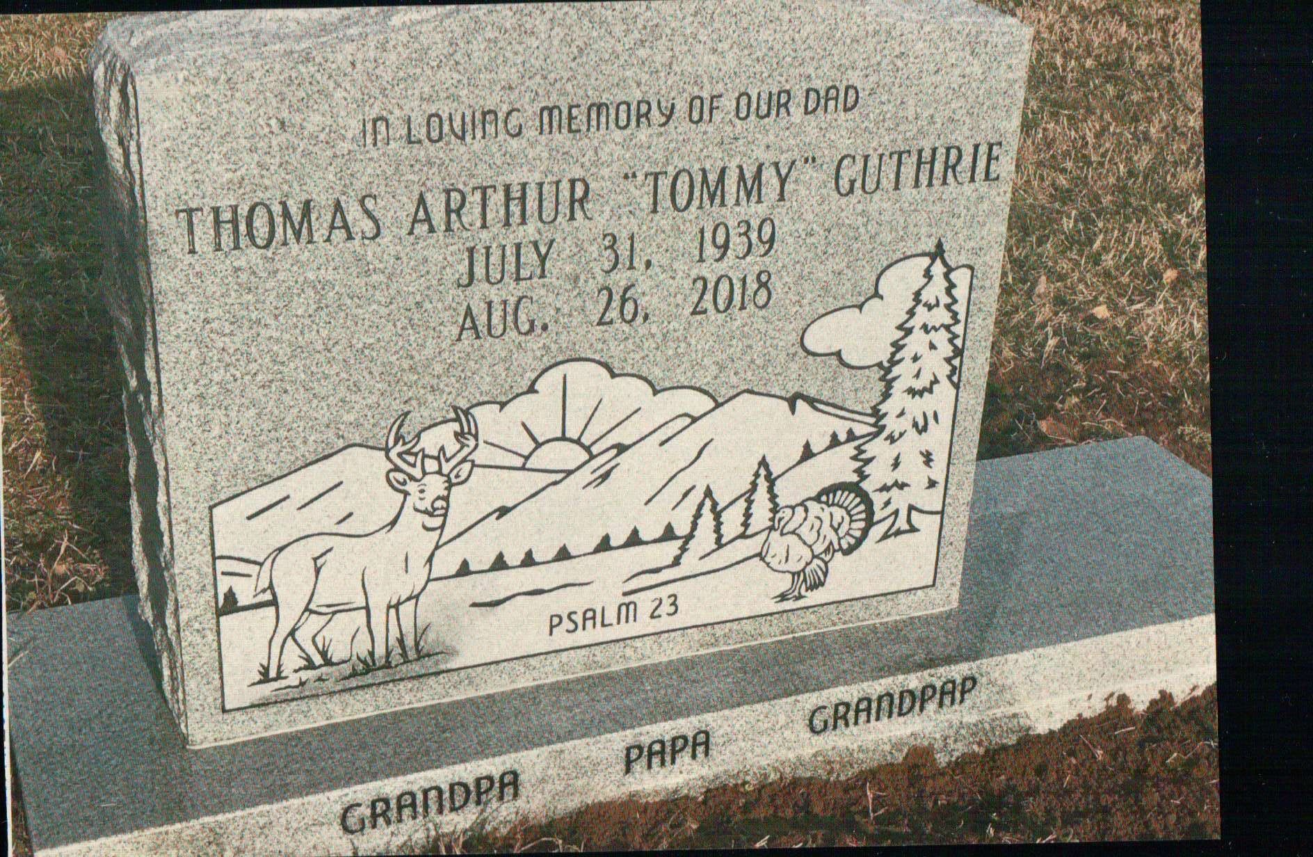 A granite headstone for Thomas Arthur 