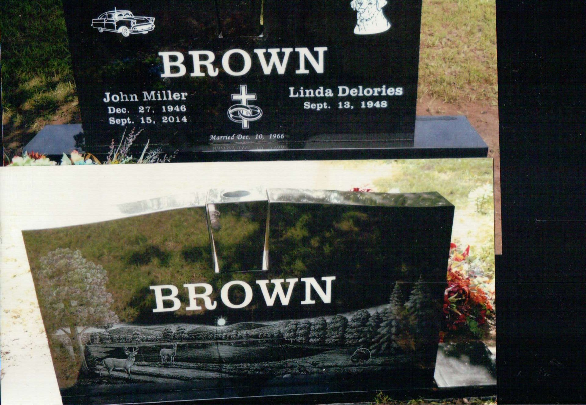 Two black granite grave markers for the Brown family, featuring carved designs of a truck, a dog, and a steam train.