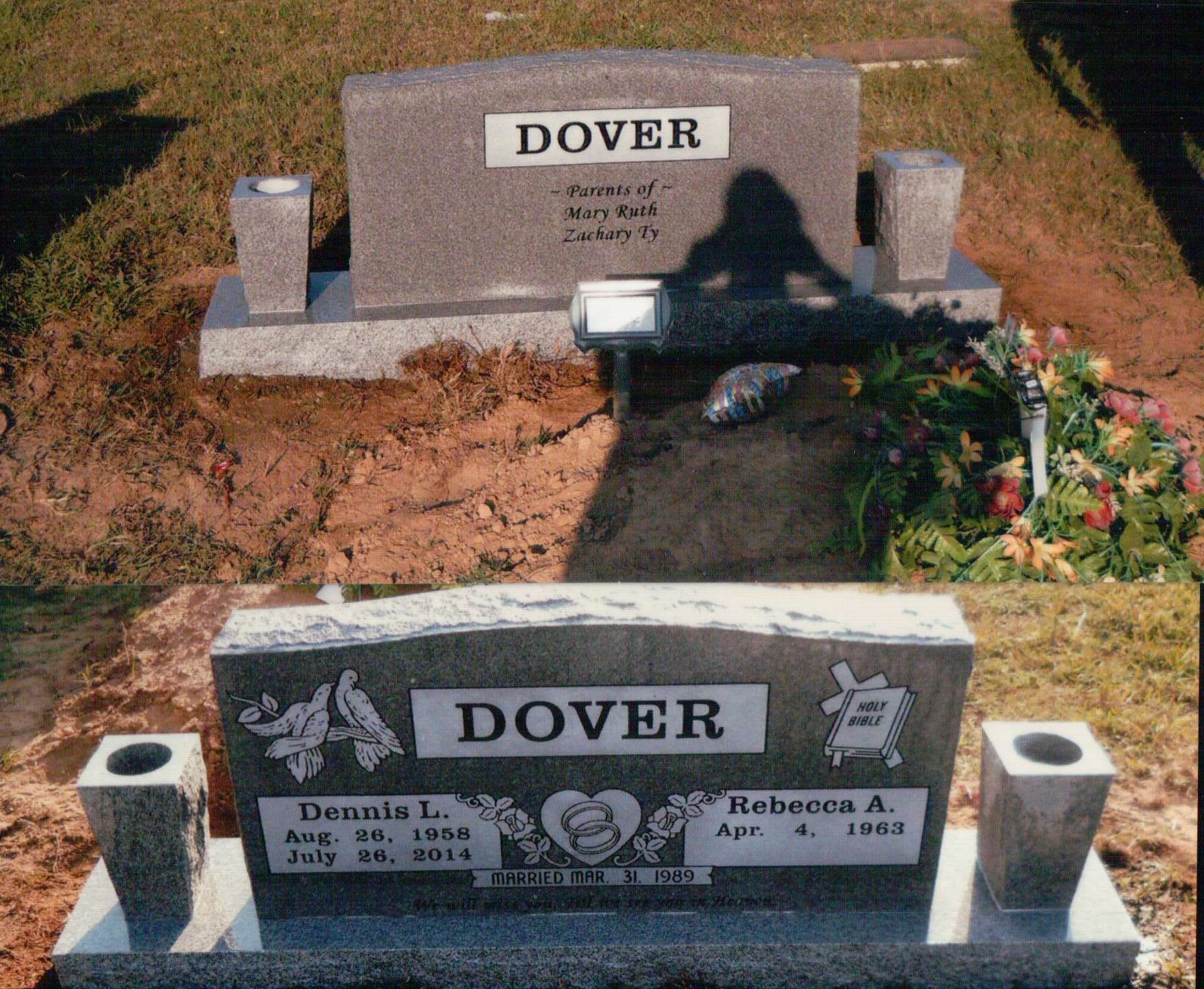 Two grey granite headstones for the Dover family, marked with birth and death dates, located in a grassy cemetery.
