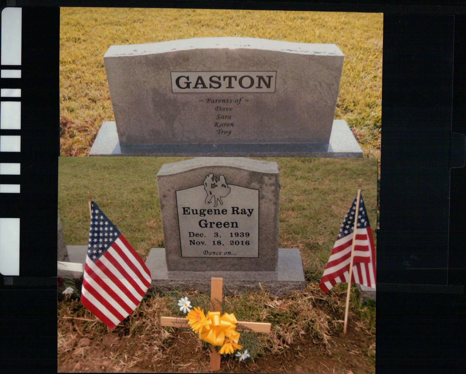 Two headstones set in grass, one marked 